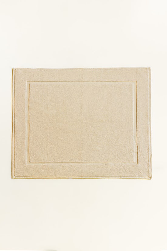 cream terry bath mat gulahmed front. 1